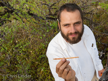 Andy Bunn with a tree core and straw behind his ear