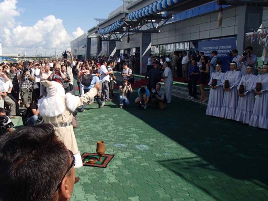 A Shaman uses tradition dance and song to bless the new Yakutsk airport terminal.