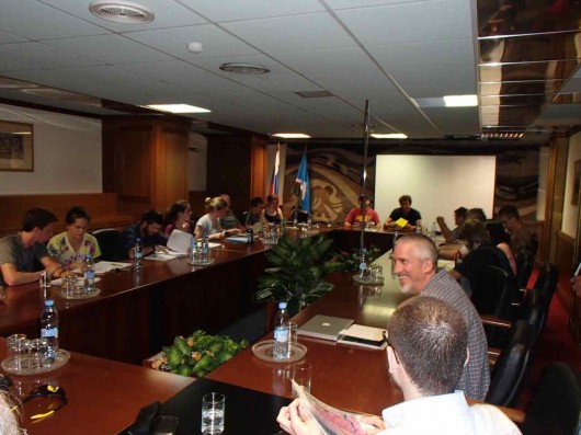 Polaris Project students and advisors exchange research project ideas in a surprisingly fancy conference room during our extended day in Yakutsk.