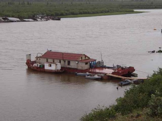 Undergraduate students stay on the Barge on the Panteleikha River, a tributary of the Kolyma River.