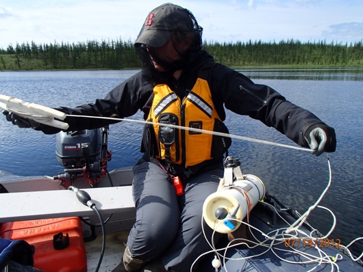 Dr. Karen Frey prepares the Van Dorn bottle for deep water sampling.