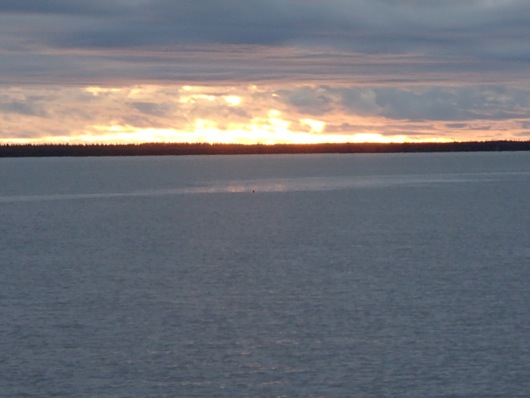 The first color of the late night broke at 11:10 p.m. as the clouds lifted.