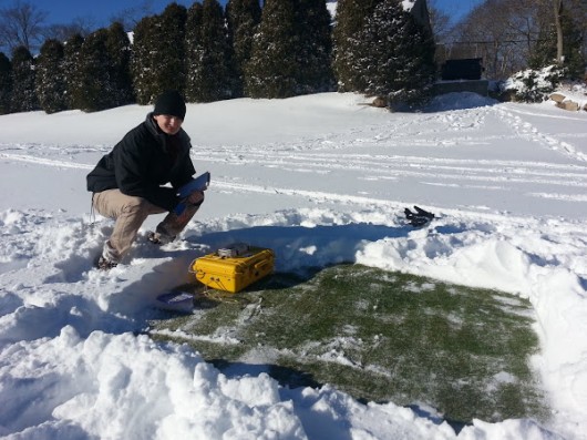 Alex measuring winter respiration under a foot of snow at a nearby golf course.
