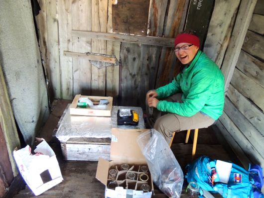 Kenzie in the “lab shack” weighing soil samples.