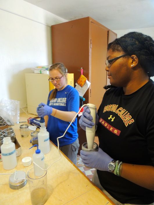 Jess and Kenzie mix their water samples for analysis.