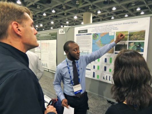 Nigel Golden presents his research on arctic ground squirrels. Photo by John Wood.