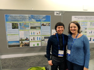 Homero Pena (2014) and Polaris Project scientist, Heather Alexander, proudly show off his poster about arctic shrubs and their impacts on soil carbon