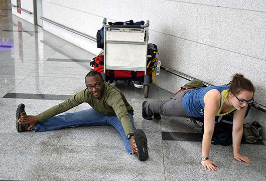 Airport yoga. © John Schade