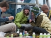 Polaris students filter water on the barge.