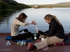 Blaize Denfeld and Professor Karen Frey filter water on the barge.