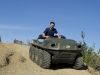 Travis Drake drives the ARGO amphibious vehicle.
