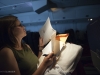 Kayla Henson reads papers on the flight to Moscow.