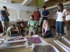 Andy Bunn and Karen Frey show students satellite images of the Cherskiy area in a Yakutsk hotel lobby.