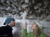 Travis Drake and Erin Seybold investigate ice crystals growing from the roof of a permafrost tunnel in the Melnikov Permafrost Institute, Yakutsk, Siberia, Russia.